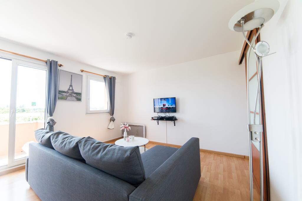 Appartement Le Marnois-Gare à Noisy-le-Grand Chambre photo